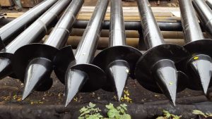 Железные винтовые сваи: что это такое и где они используются?